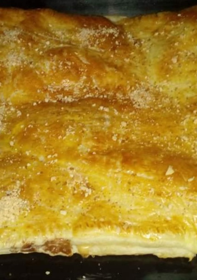 Una foto de Empanada de natillas