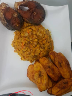 A picture of Porridge beans and fried plantain with fish.