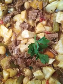 Una foto de Ropa vieja carne y pollo!!
