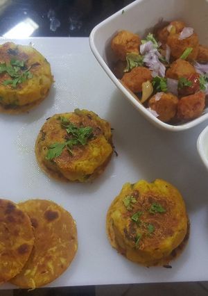 A picture of Bottle gourd (lauki) Paratha with fried soya chunks and aloo tikki.