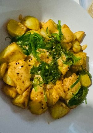 A picture of Patatas Bravas with Kimchi Mayo and Wakame.