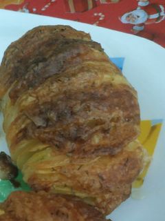 Una foto de Papas al horno con queso