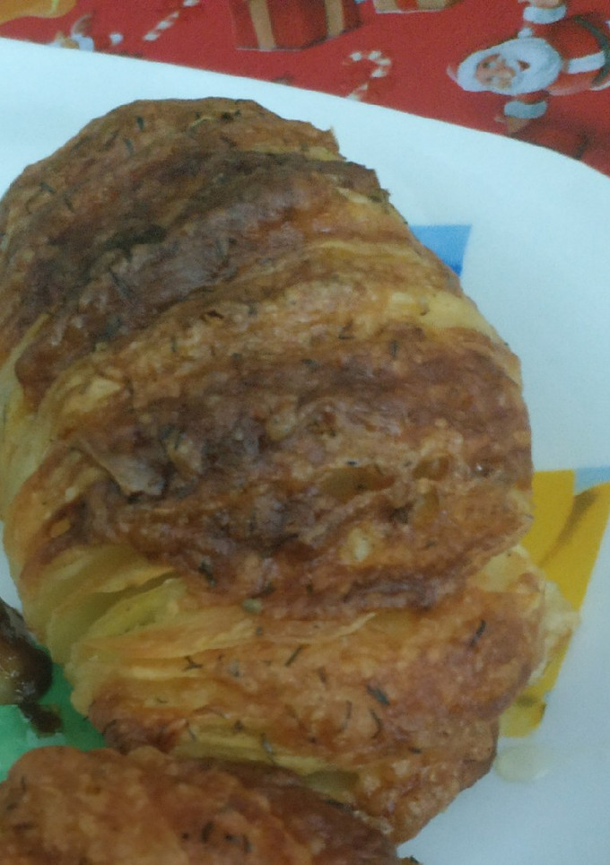 Una foto de Papas al horno con queso