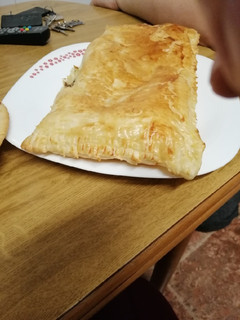 Una foto de Empanada de carne y queso