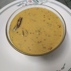 A picture of Nuvulu Pappu Pulusu/ Andhra Style Sesame Seeds Curry.