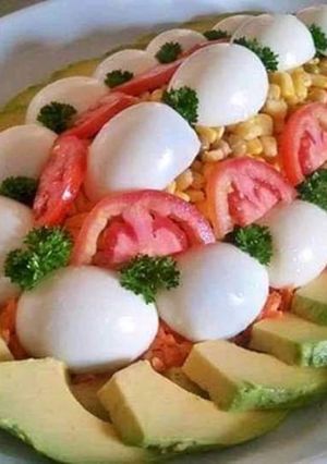 A picture of Boil eggs with salad.