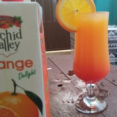 A picture of Orange Sunset Mocktail.