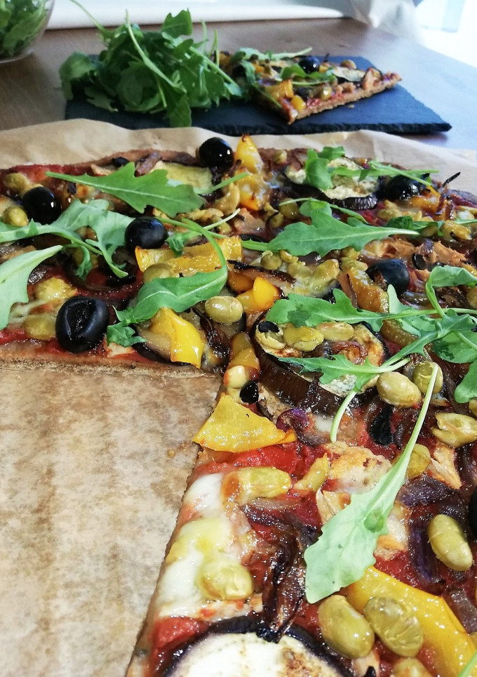 Una foto de Pizza de restos