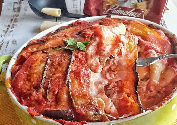 Paccheri ripieni di ricotta in tortiera di melanzane