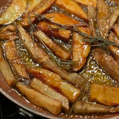 A picture of Fried potatoes - garlic, rosemary, thyme.