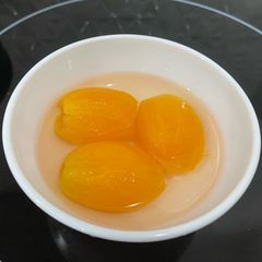 A picture of Plam Mango in Syrup.