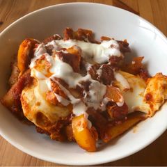 A picture of Shakshuka with Sausage.