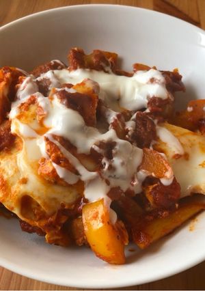 A picture of Shakshuka with Sausage.