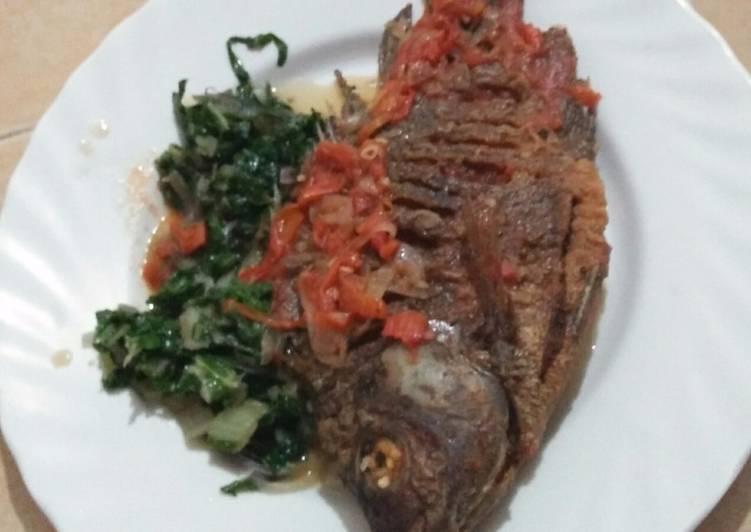 Wet fried fish with spinach