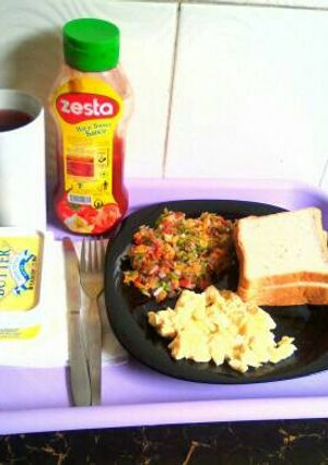A picture of Hibiscus tea,bread and eggs.