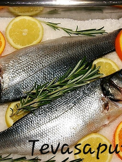 Una foto de Lubina a la sal 🍊🍋 🍊🍃 🐟