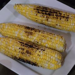 A picture of Grilled and Cajun corn.