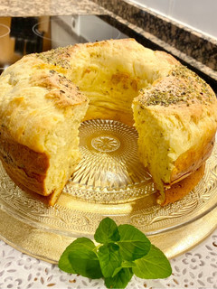 Una foto de Pastel salado con queso crema, pecorino, parmesano y provolone