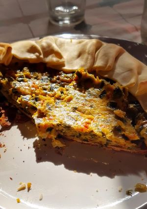 Una foto de Tarta de puerro con cebolla de verdeo