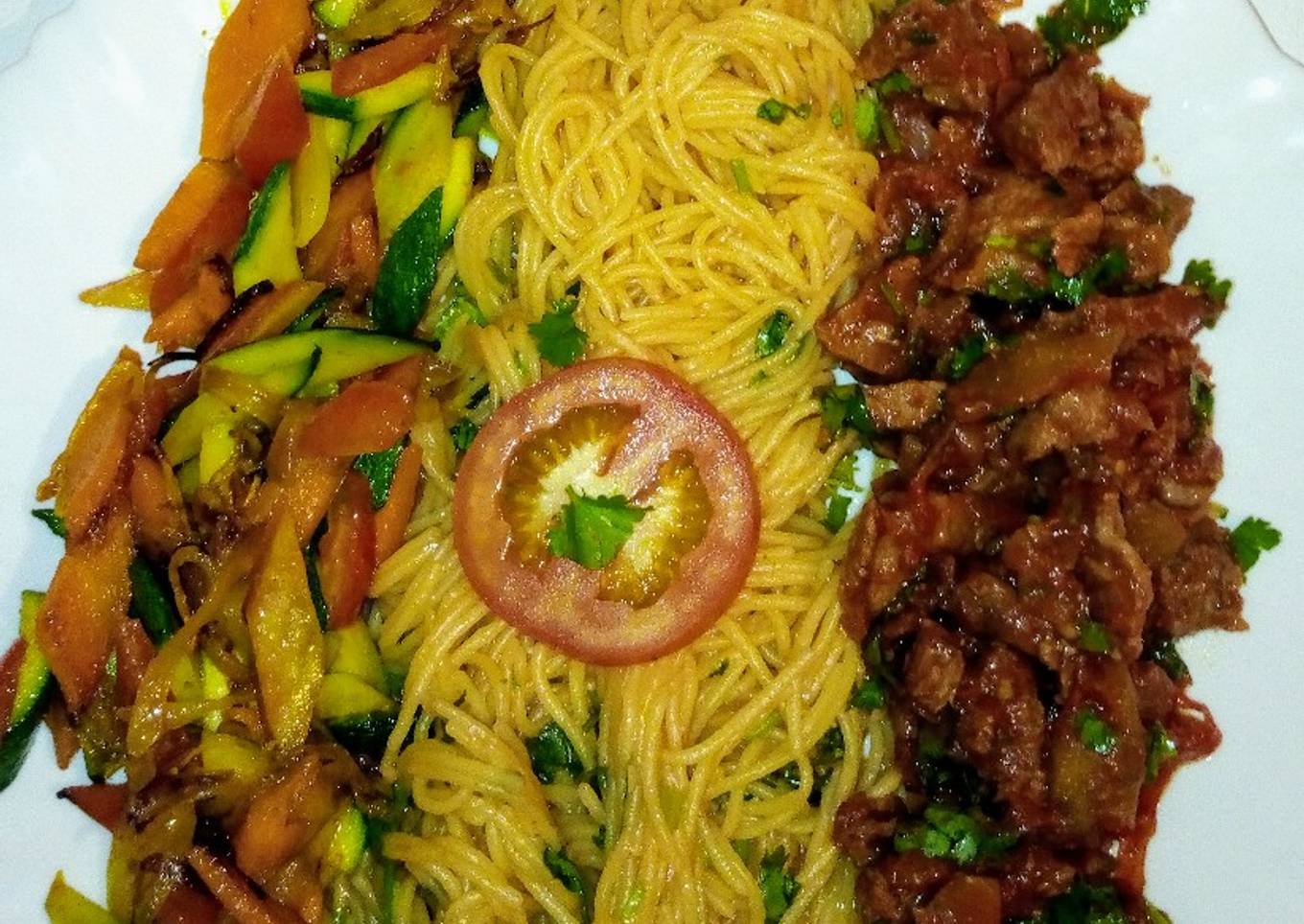 Spaghetti on tomato sauce,wet fry beef, sauteed vegetables..,