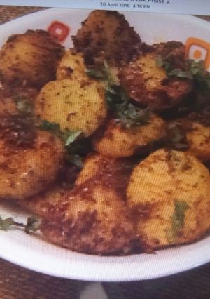 A picture of Achari Dum Aloo.