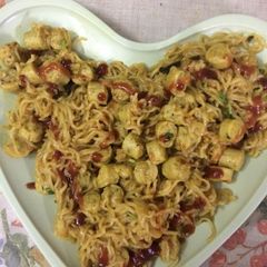 A picture of Maggi sausages biryani.
