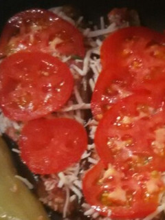 A picture of Stuffed Eggplants 🍆 with Ground Beef and Grated Kefalotyri Cheese.