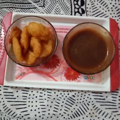A picture of Dall vada with tamarind chutney.
