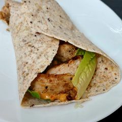 My Char grilled Chicken in a wrap 😋 A picture of My Char grilled Chicken in a wrap 😋.