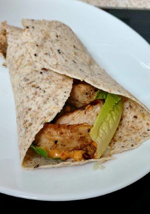 A picture of My Char grilled Chicken in a wrap 😋.
