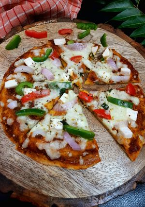 A picture of Pizza Paratha or Desi Pizza, without oven.