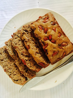 A picture of Banana bread and chopped dates.