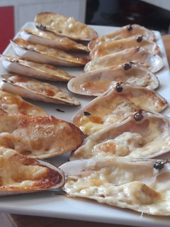 Una foto de Machas a la parmesana