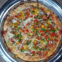 A picture of Pizza🍕🍕🍕.