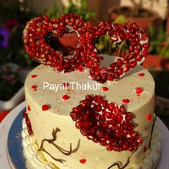 A picture of Chocolate Geode Cake with Pomegranate Seeds.