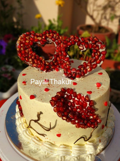 A picture of Chocolate Geode Cake with Pomegranate Seeds.