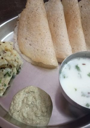 A picture of Vrat ka dosa with aloo sabzi and peanuts chutney and masala chanch.