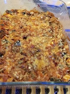 Una foto de Verduras con pollo a la parmesana