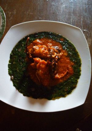 A picture of Ewedu soup and tomatoes stew.