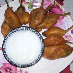 A picture of Potato Stuffed Chilli Fritters.