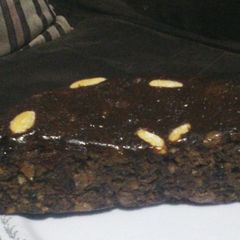 A picture of Christmas Cake with Almonds.
