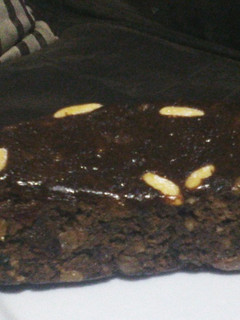 A picture of Christmas Cake with Almonds.