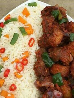 A picture of Rice with fried beef.