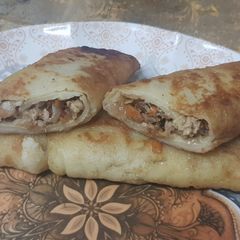 A picture of Chicken vegetable German cheese Rolls.
