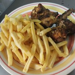 A picture of Fried irish potatoes with chicken.