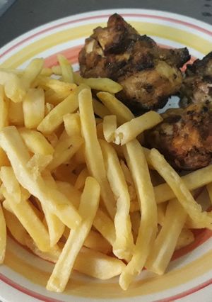 A picture of Fried irish potatoes with chicken.