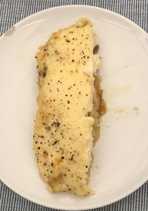 Una foto de Pastel salado de bacalao y patatas a lo pobre