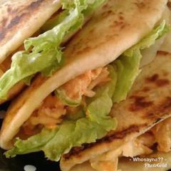 A picture of Whosayna’s Steak and Masala Fries Wraps.