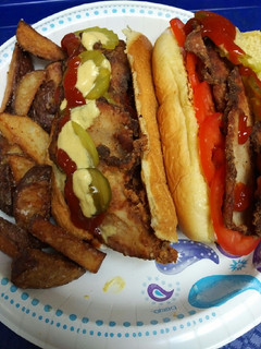 A picture of Fried Greek Inspired Pork Sandwich.