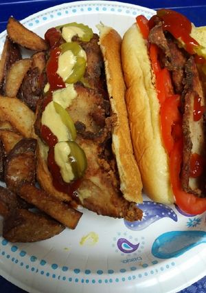 A picture of Fried Greek Inspired Pork Sandwich.
